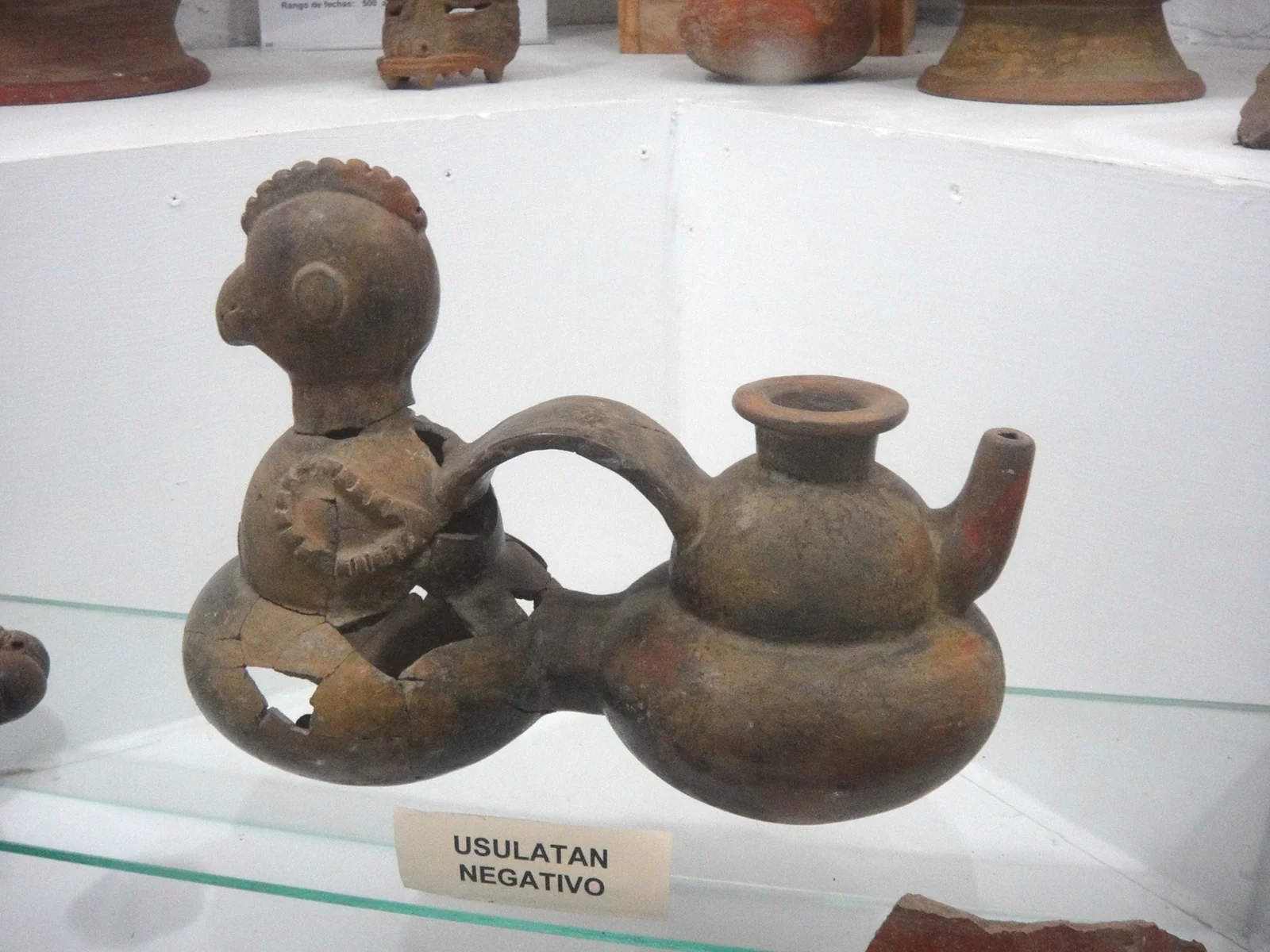 An animal-shaped ceramic vessel displayed at El Ceibo museum, photographed in 2010